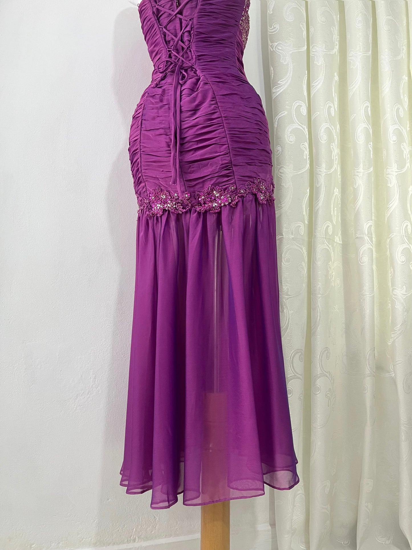 Purple corset dress with embroidered sequin and floral designs