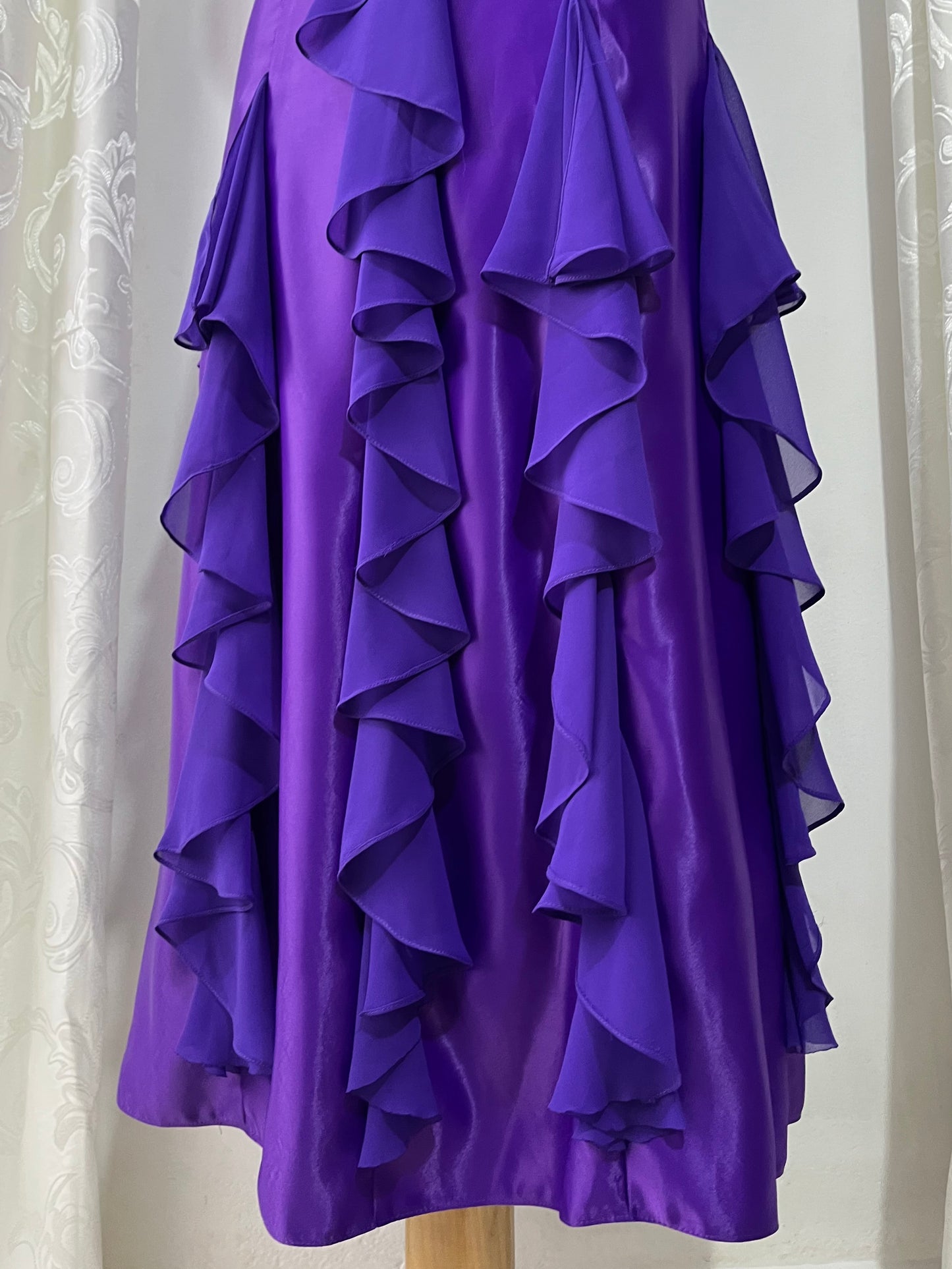 Royal purple corset gown with ruffles