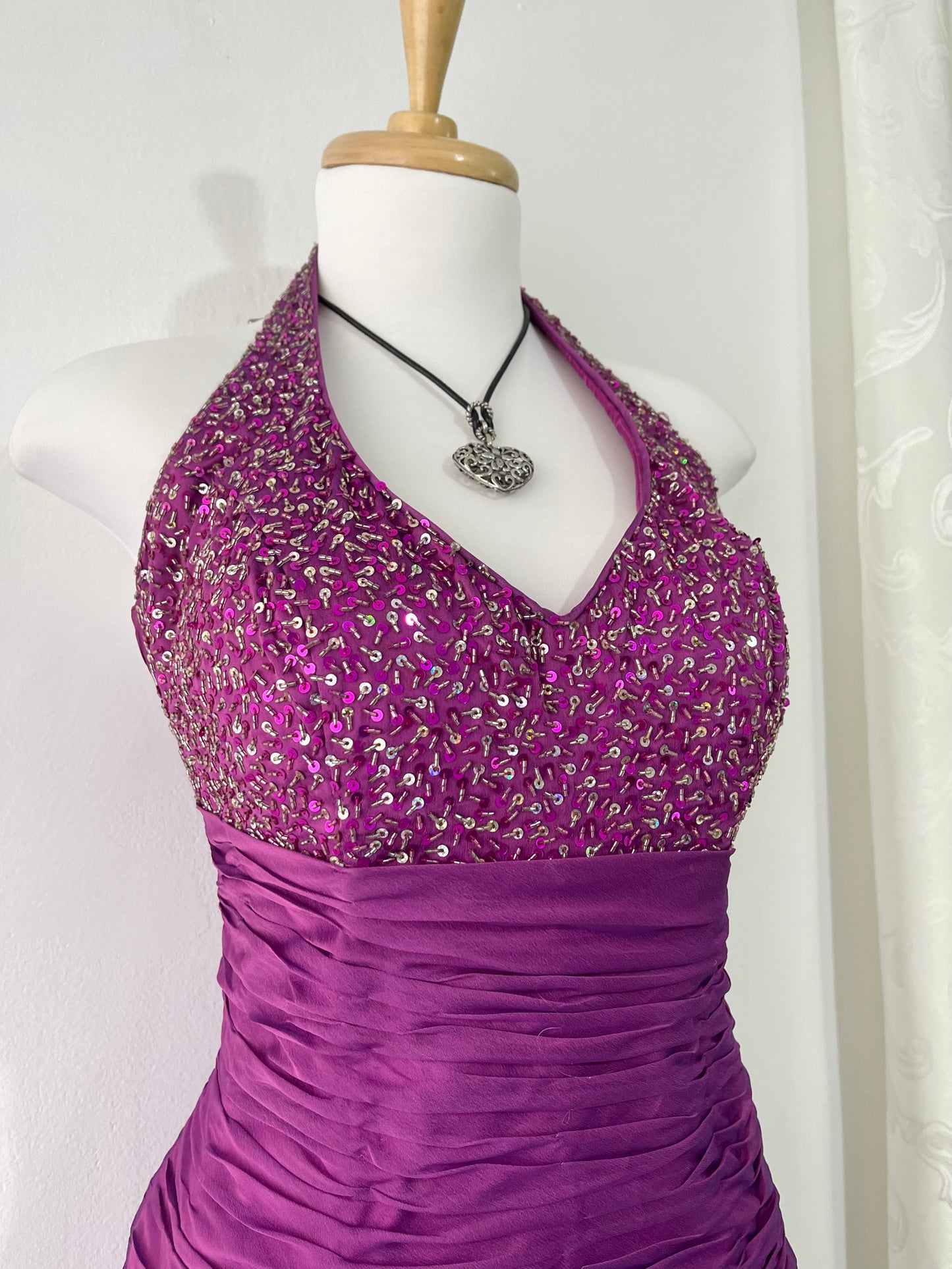 Purple corset dress with embroidered sequin and floral designs