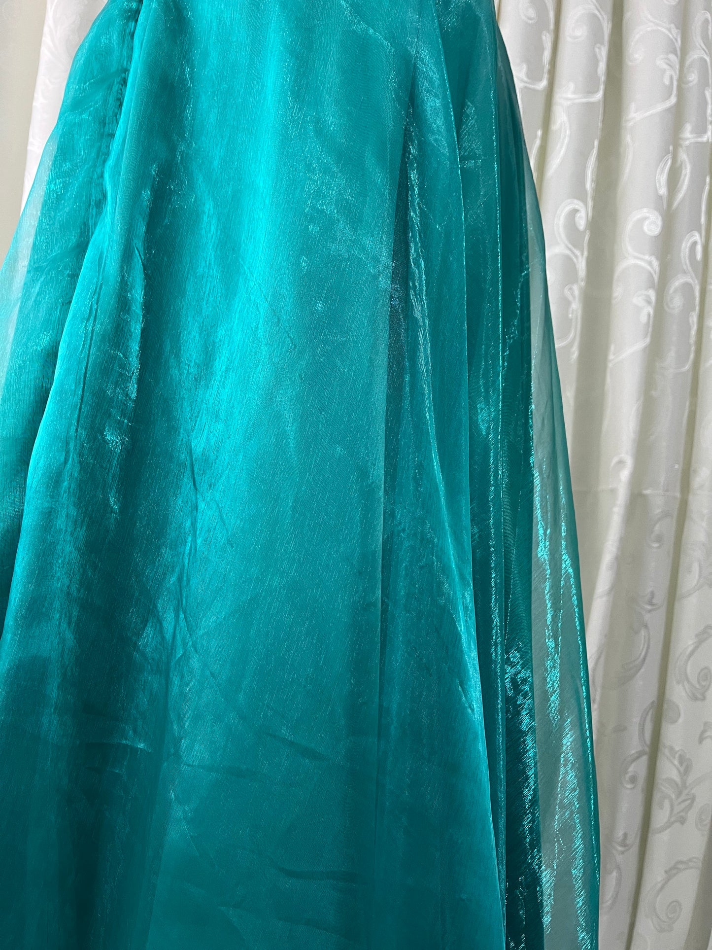 Turquoise dress with sequined waistband and matchinf cape