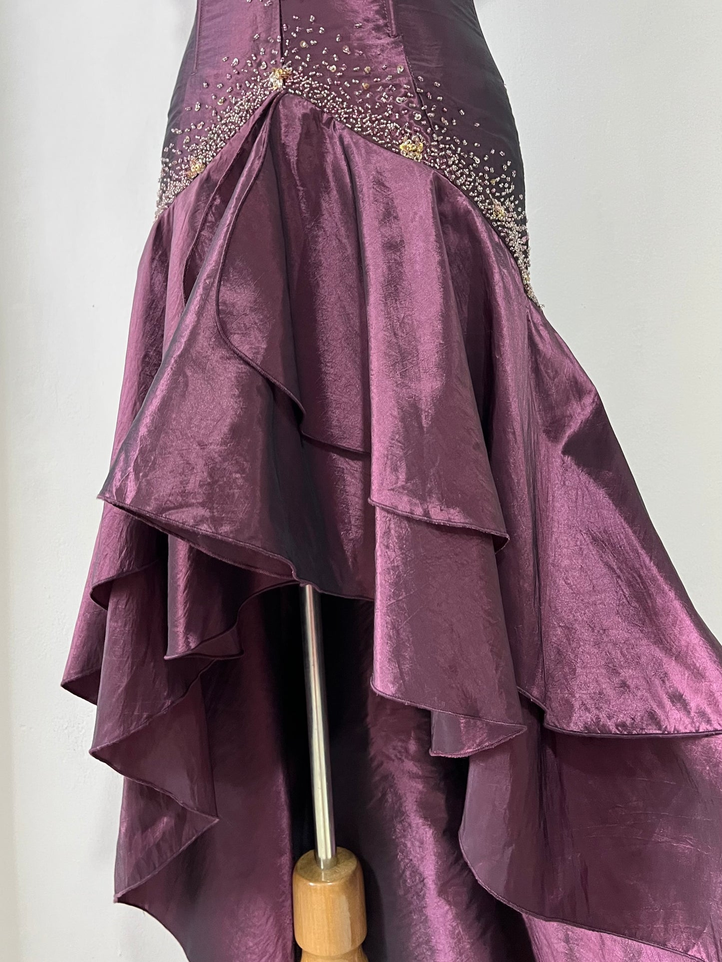 Deep purple corset dress with exquisite embellishments and hand-embroidered beads