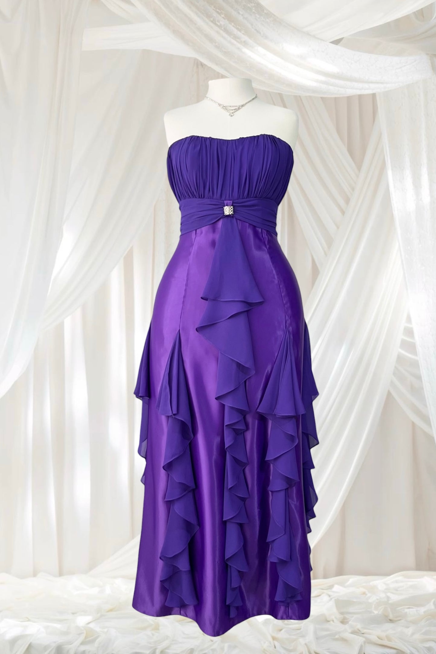 Royal purple corset gown with ruffles