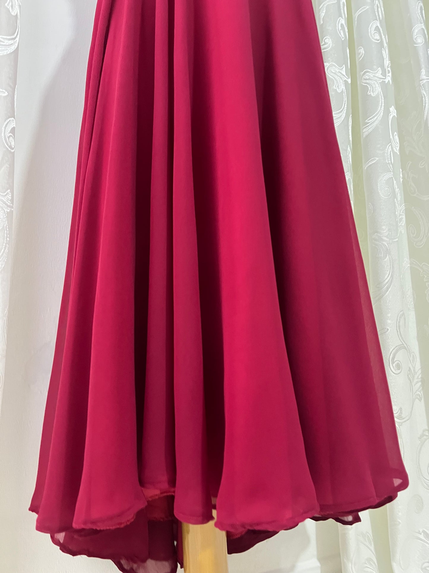 Evening gown with a bodice exquisitely hand-decorated with rhinestones and embellishments