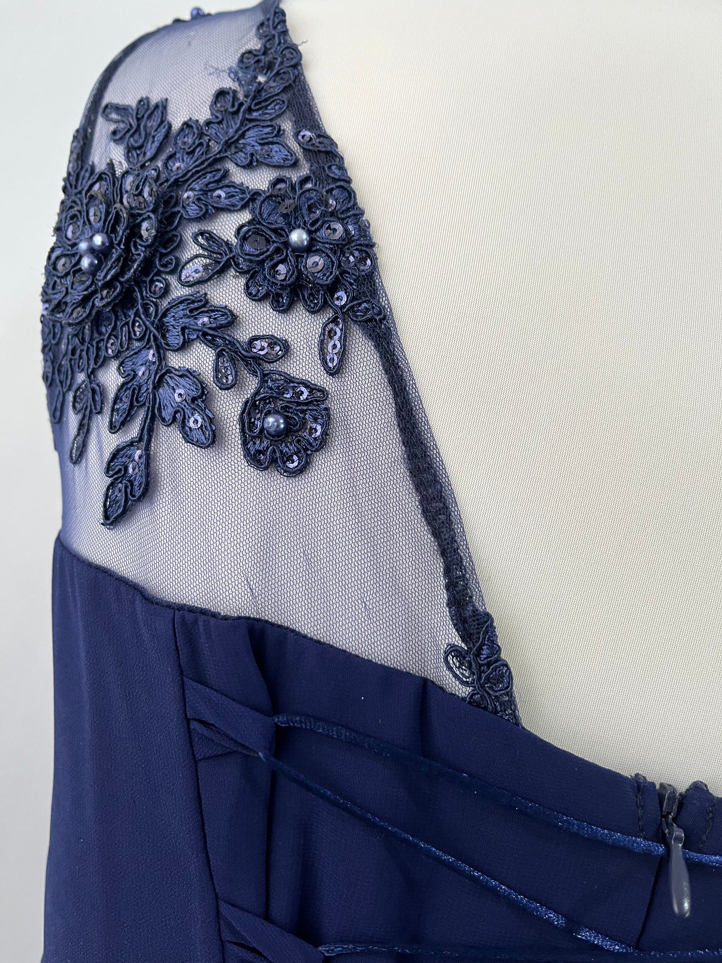 Captivating blue dress with embroidered floral designs and pearls on the chest-Size L
