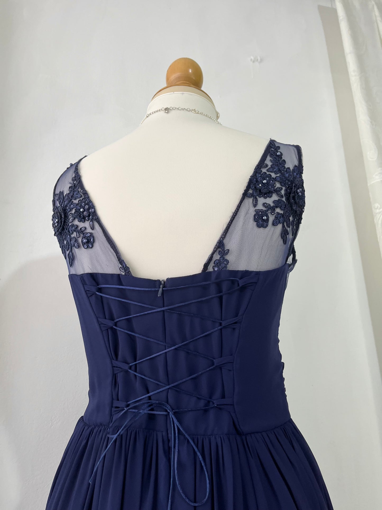 Captivating blue dress with embroidered floral designs and pearls on the chest-Size L