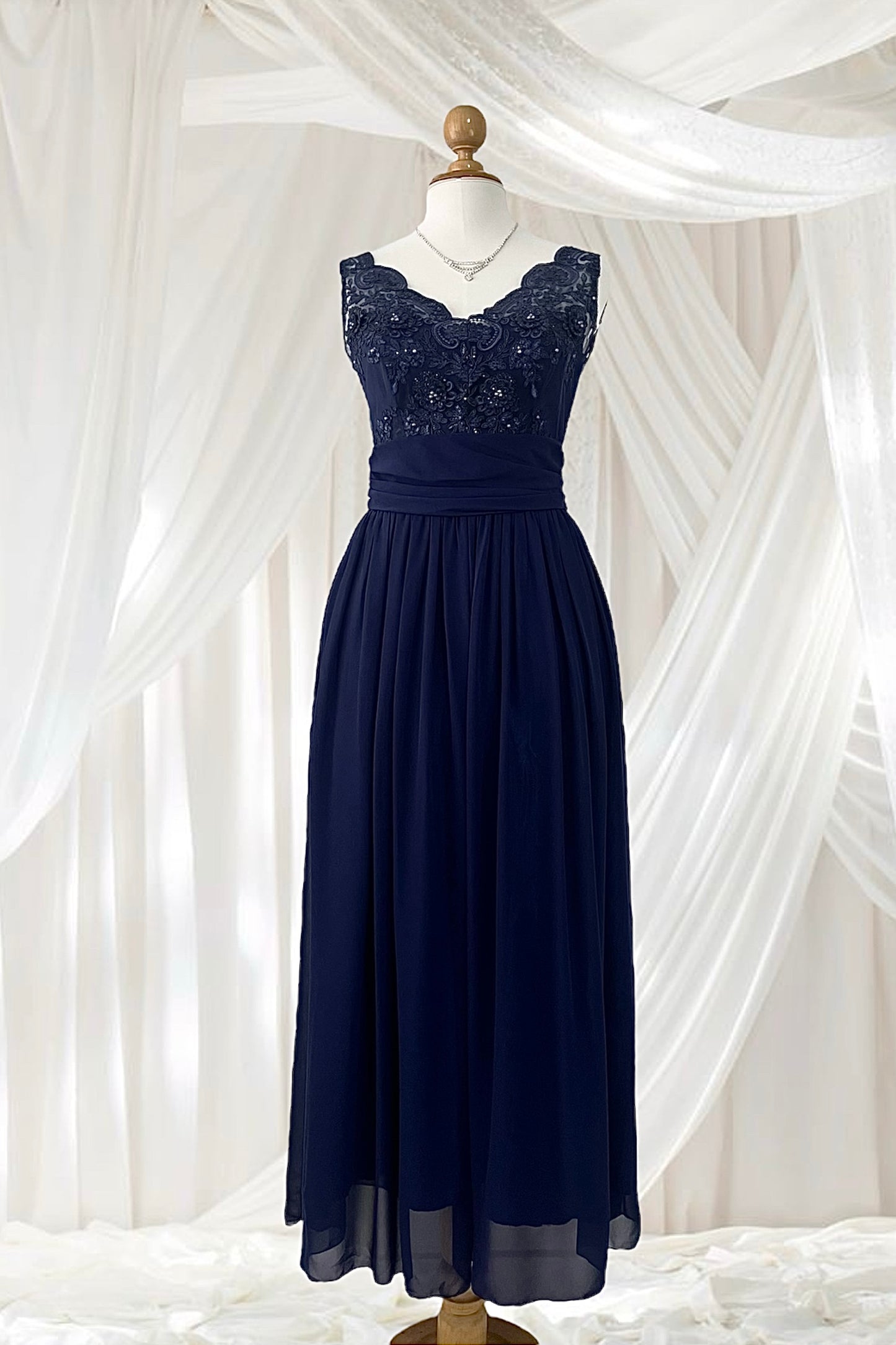 Captivating blue dress with embroidered floral designs and pearls on the chest-Size L