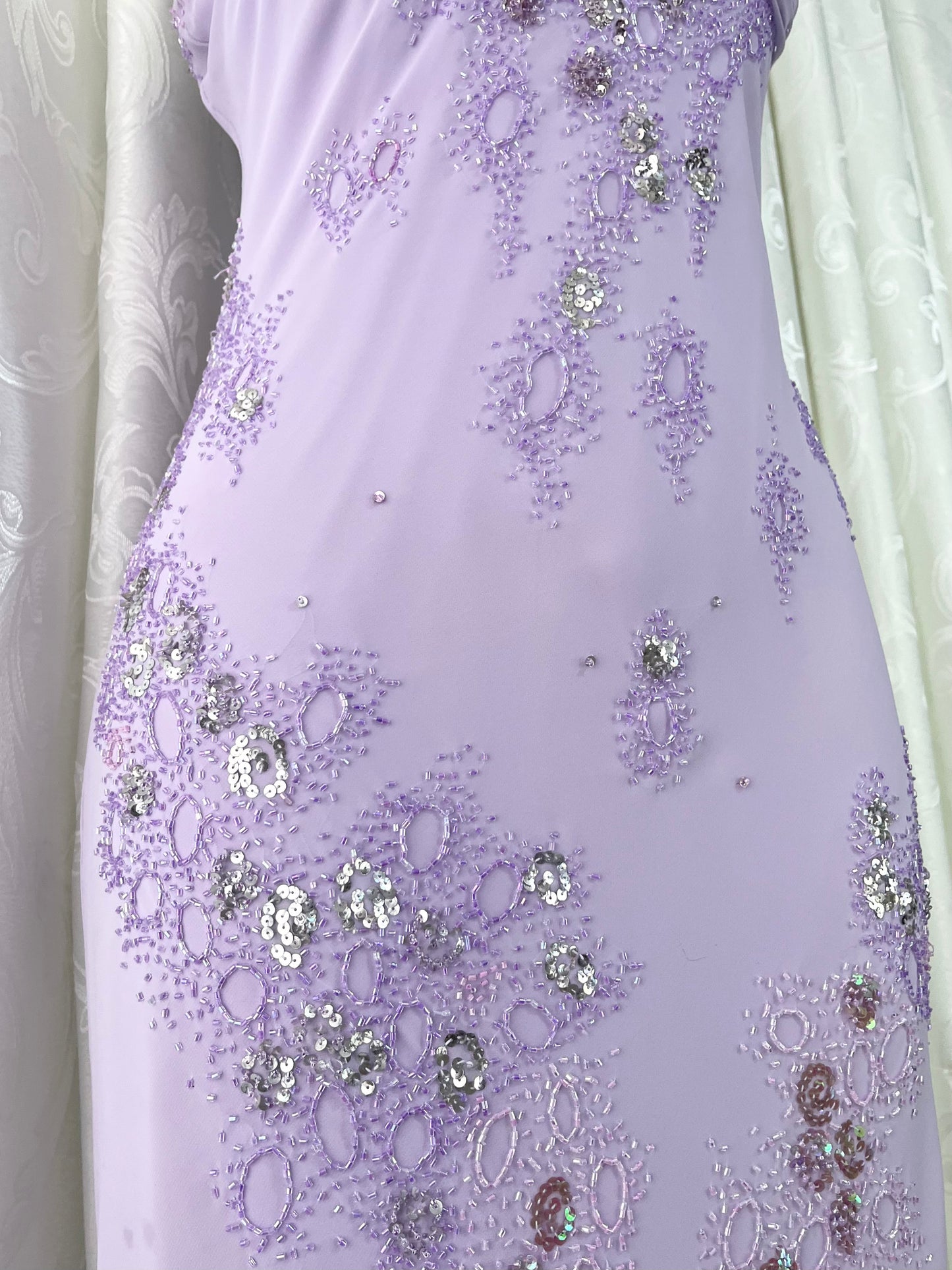 Captivating long dress in pastel lavender with sequin and bead embroidery