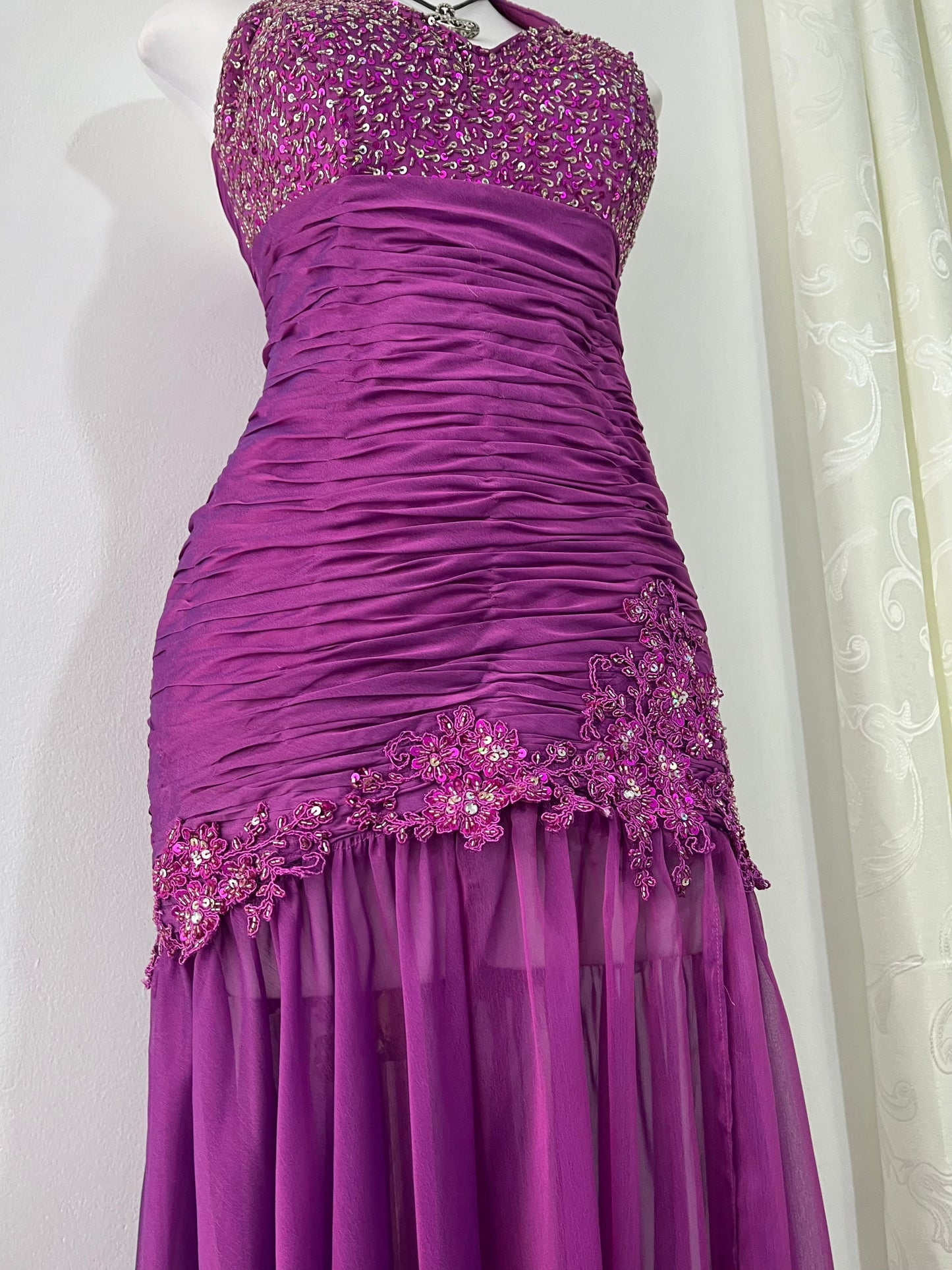 Purple corset dress with embroidered sequin and floral designs