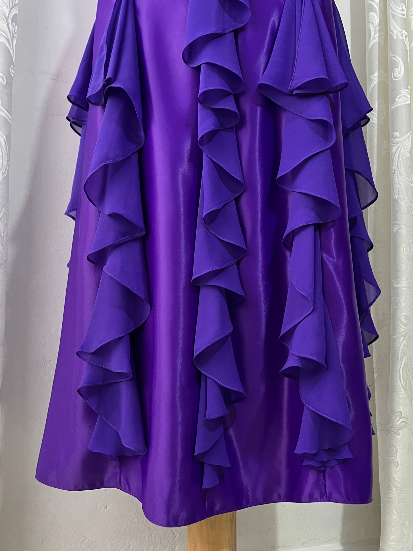 Royal purple corset gown with ruffles