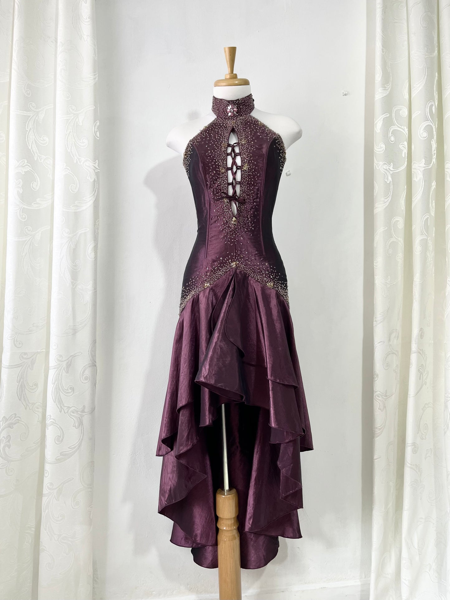 Deep purple corset dress with exquisite embellishments and hand-embroidered beads