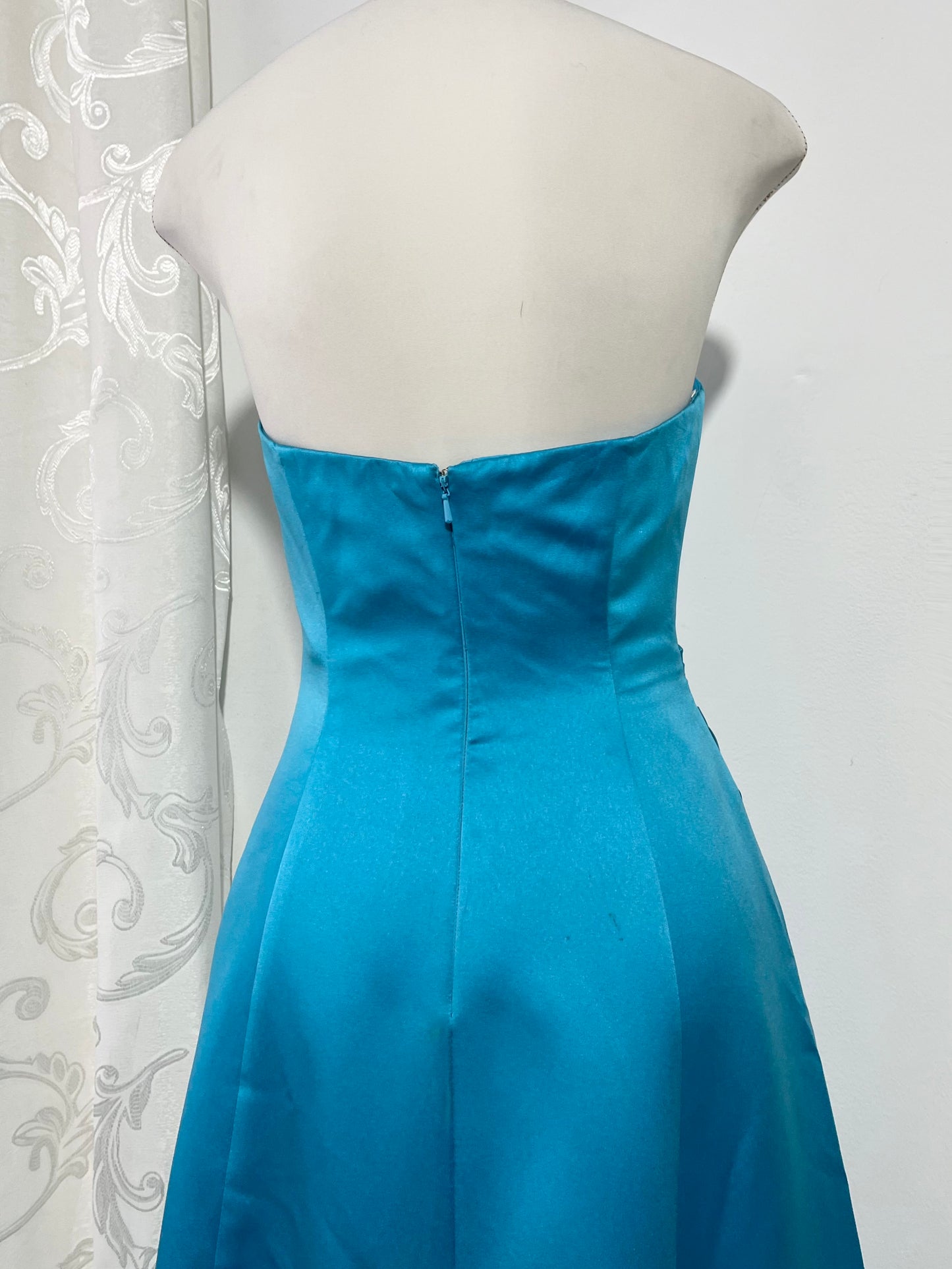 Turquoise sweetheart neckline gala gown with floral embellishments and asymmetric draped detail - size M