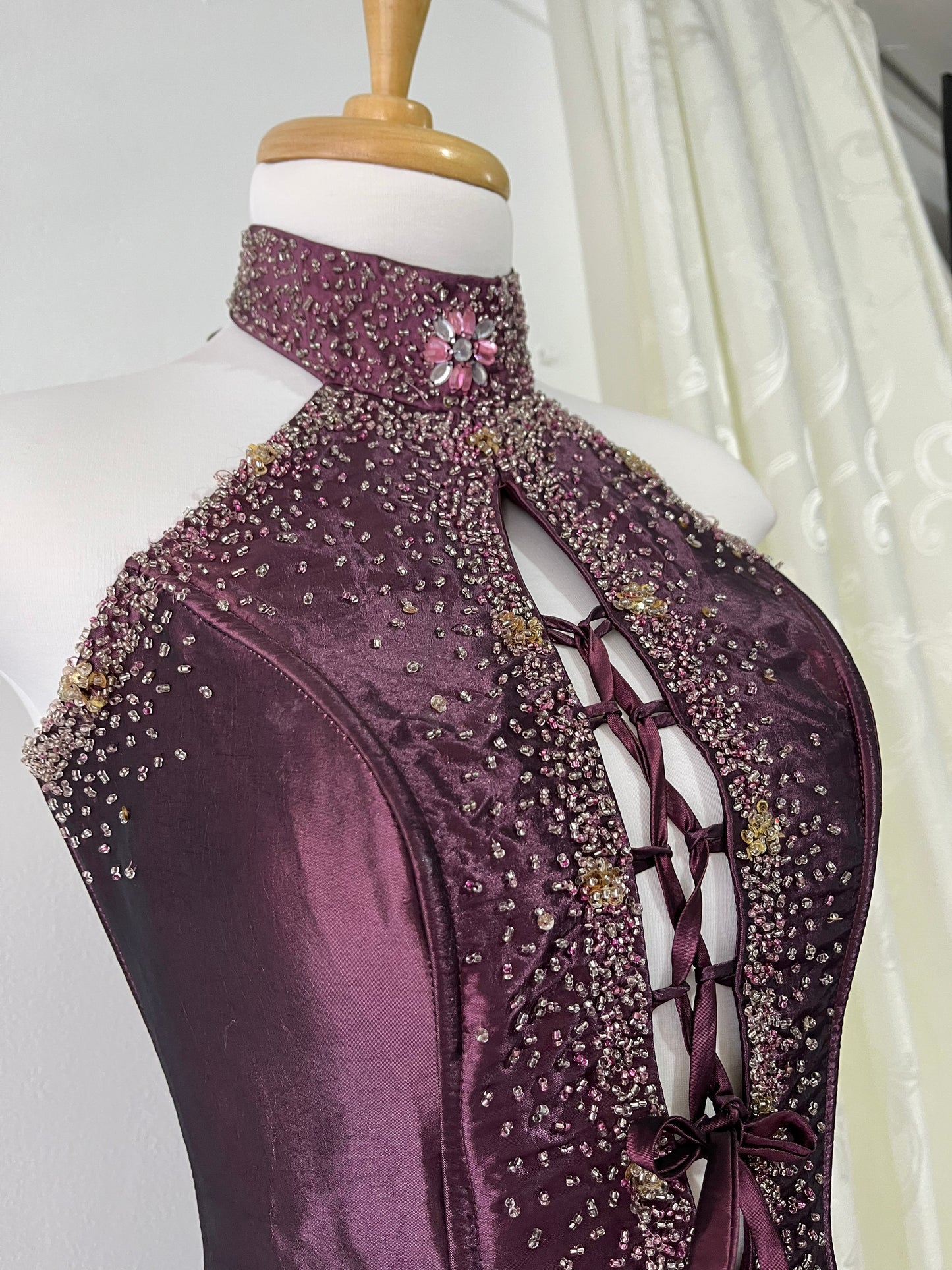 Deep purple corset dress with exquisite embellishments and hand-embroidered beads