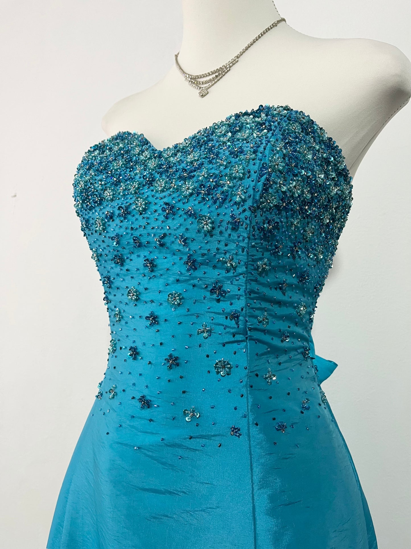 Corset evening dress in a vibrant turquoise color with exquisite handmade floral embroidery- size S
