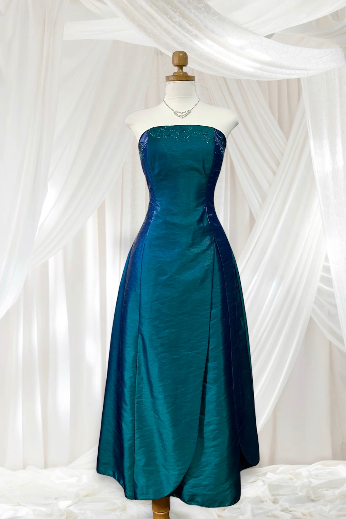 Teal corset dress in iridescent taffeta with floral appliqués and embroidery- size S