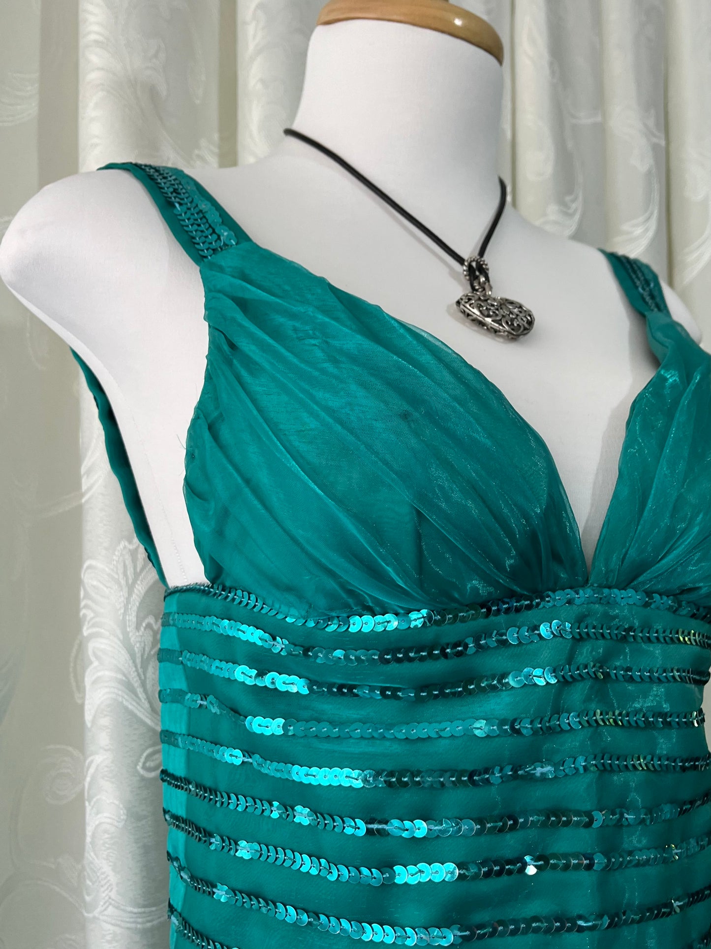 Turquoise dress with sequined waistband and matchinf cape