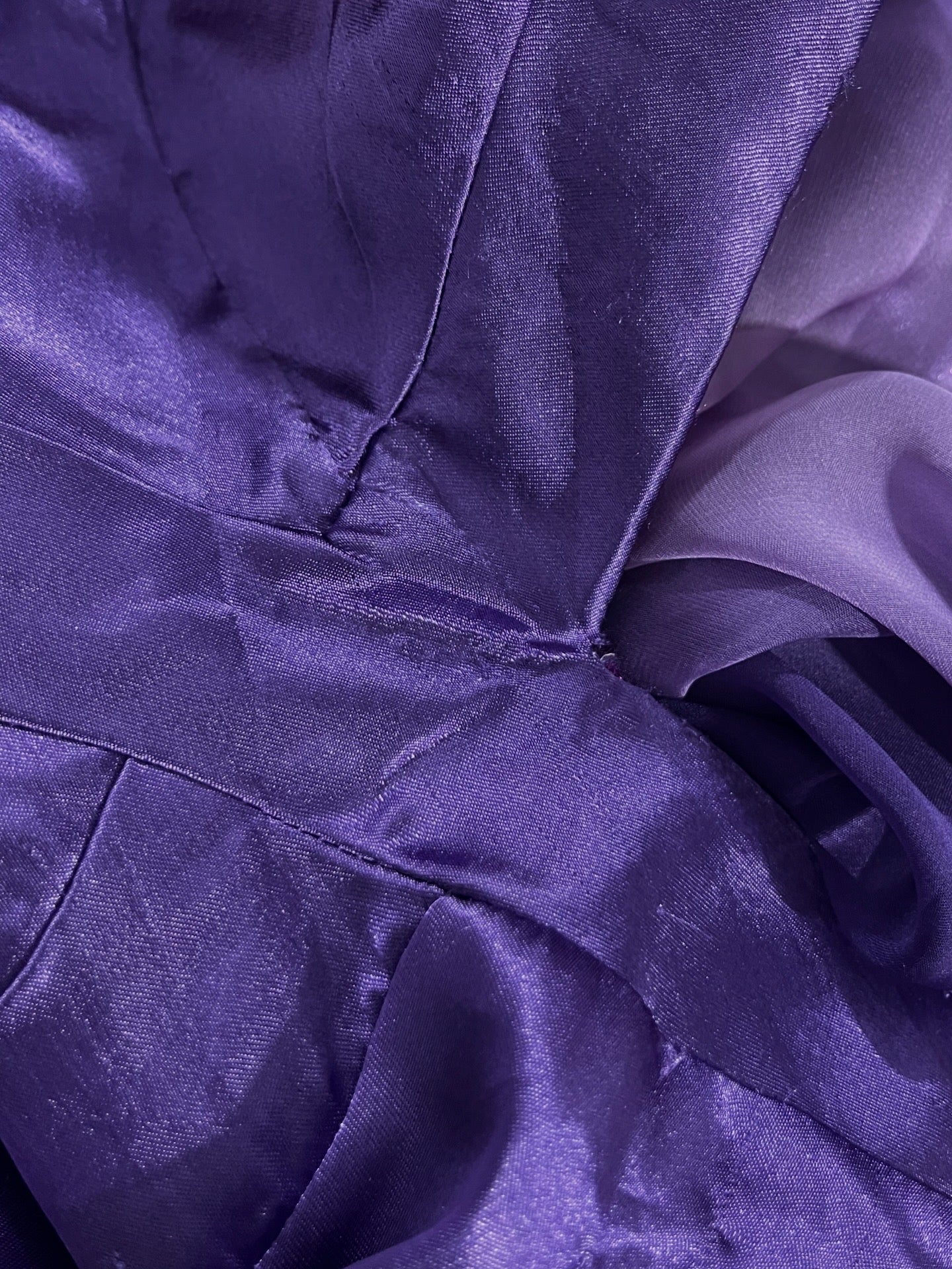 Gown in purple gradient chiffon with rhinestone appliqués at the waist and neckline