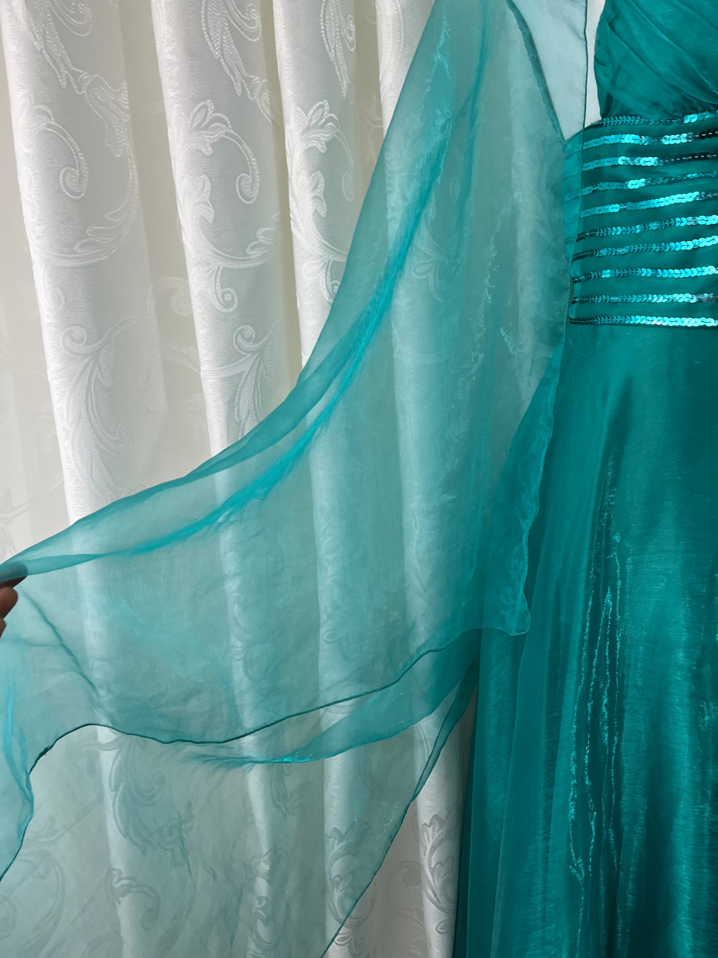 Turquoise dress with sequined waistband and matchinf cape