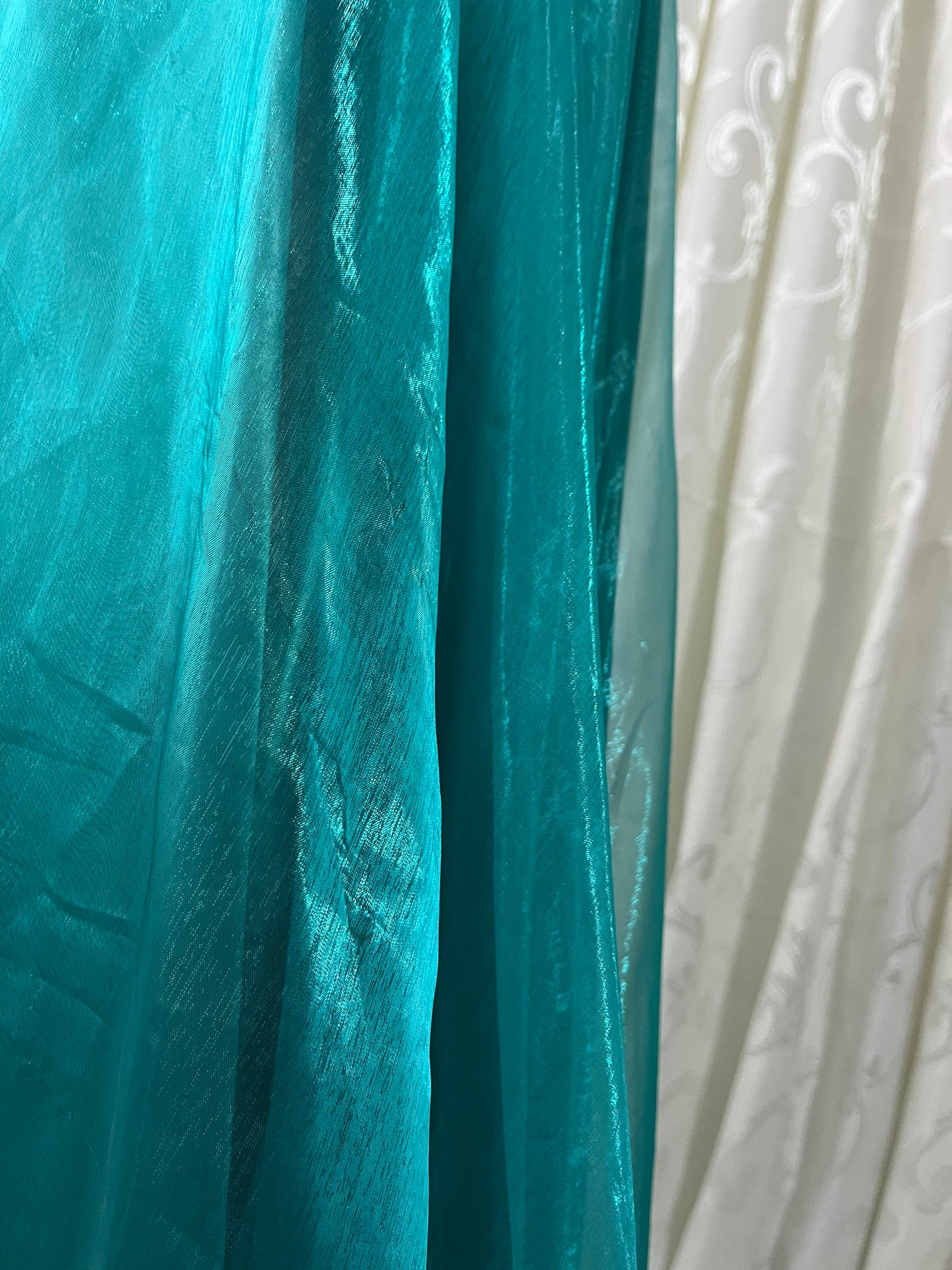Turquoise dress with sequined waistband and matchinf cape