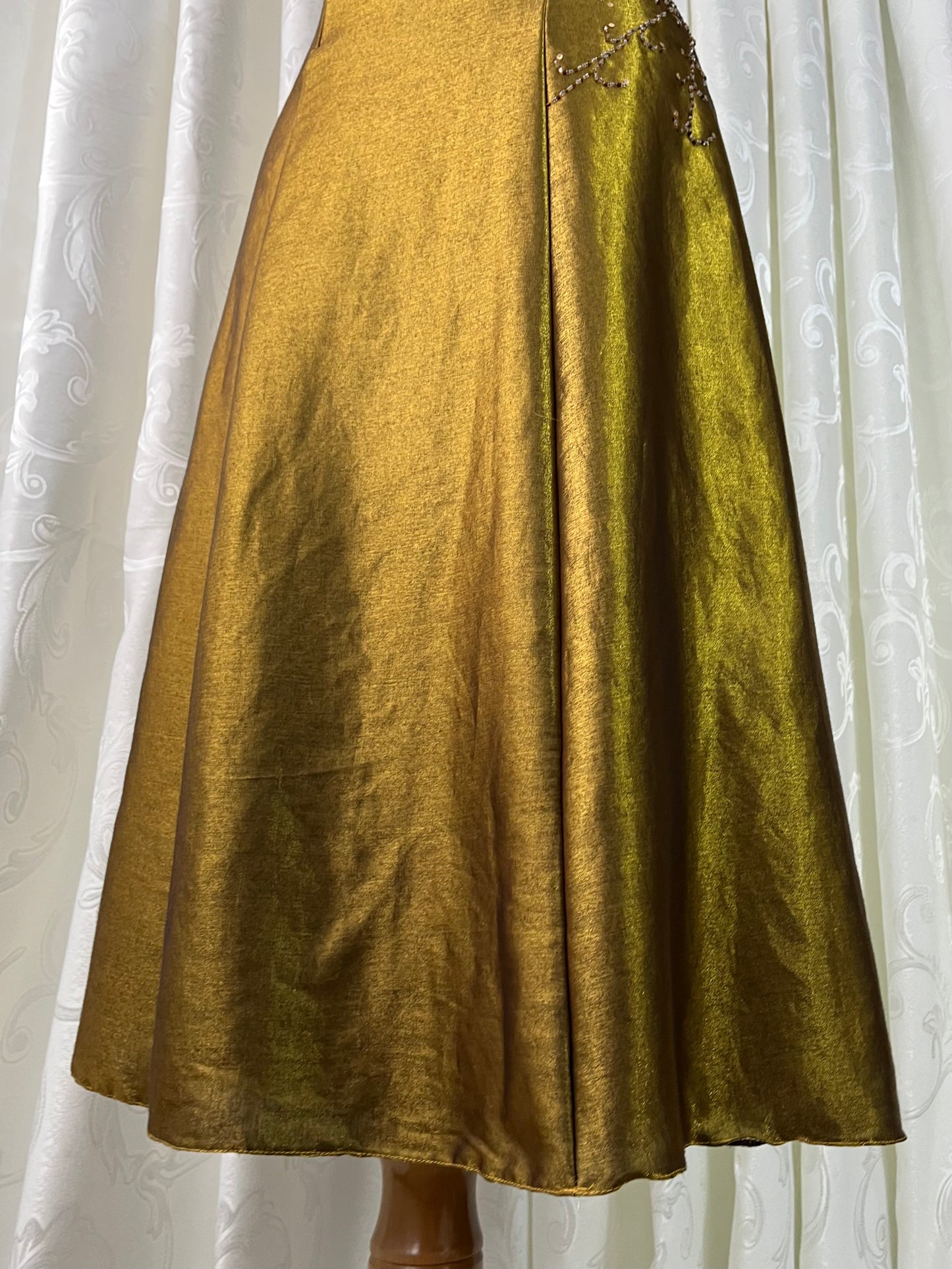 Iridescent brooch dress with fine bead embroidery